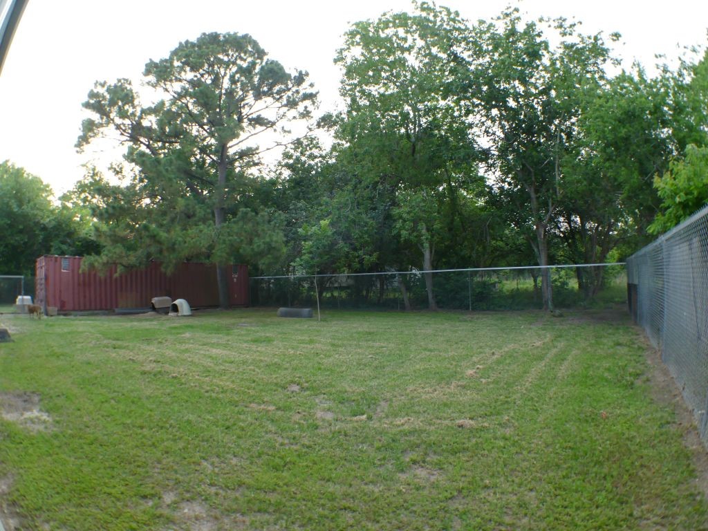 1615 East Wallisville Road Highlands, TX 77562 - Photo 10 of 32 a backyard of a house