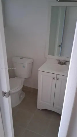 a bathroom with a sink and toilet