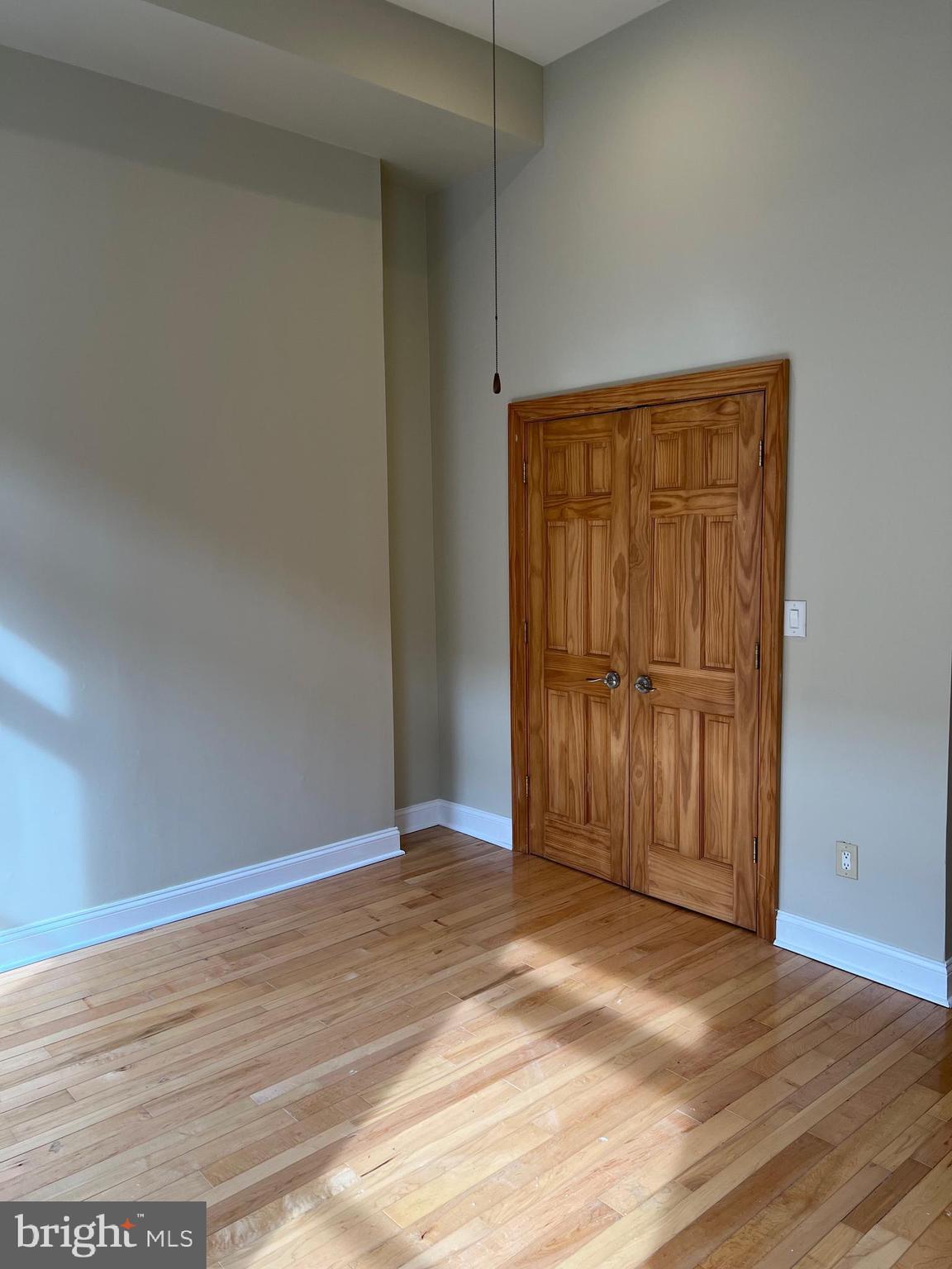 1230 North Calvert Street, Unit 1 Baltimore, MD 21202 - Photo 12 of 14 a view of an empty room