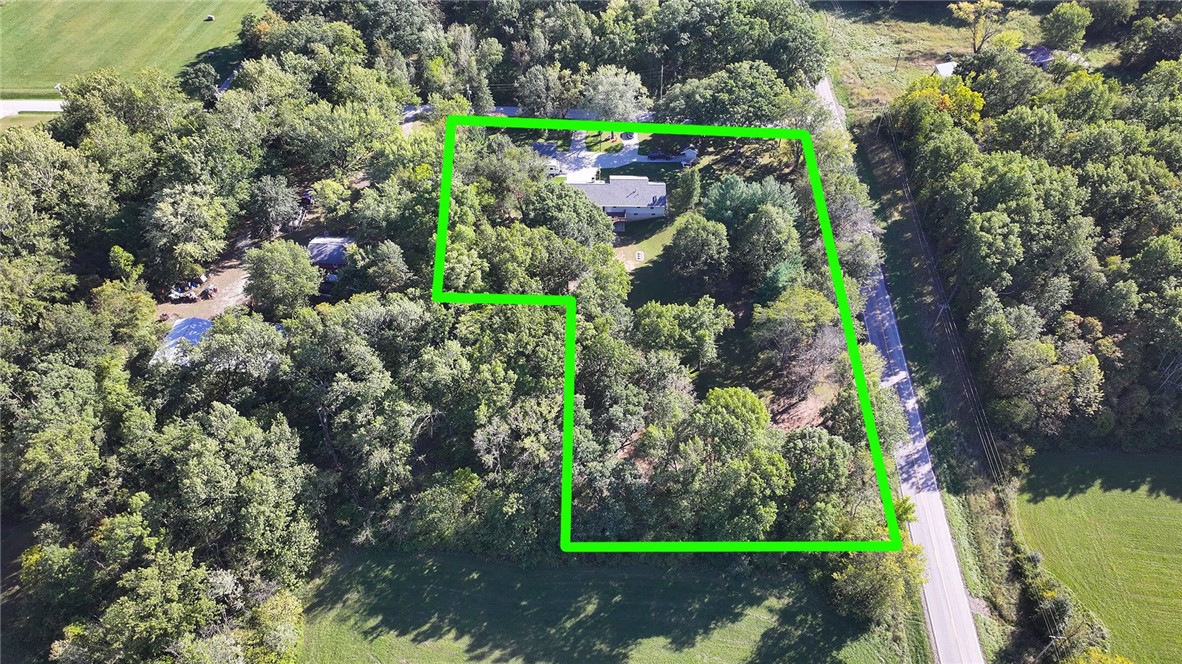 9234 Cabin Road Argenta, IL 62501 - Photo 7 of 47 an aerial view of a house with a yard and black garden