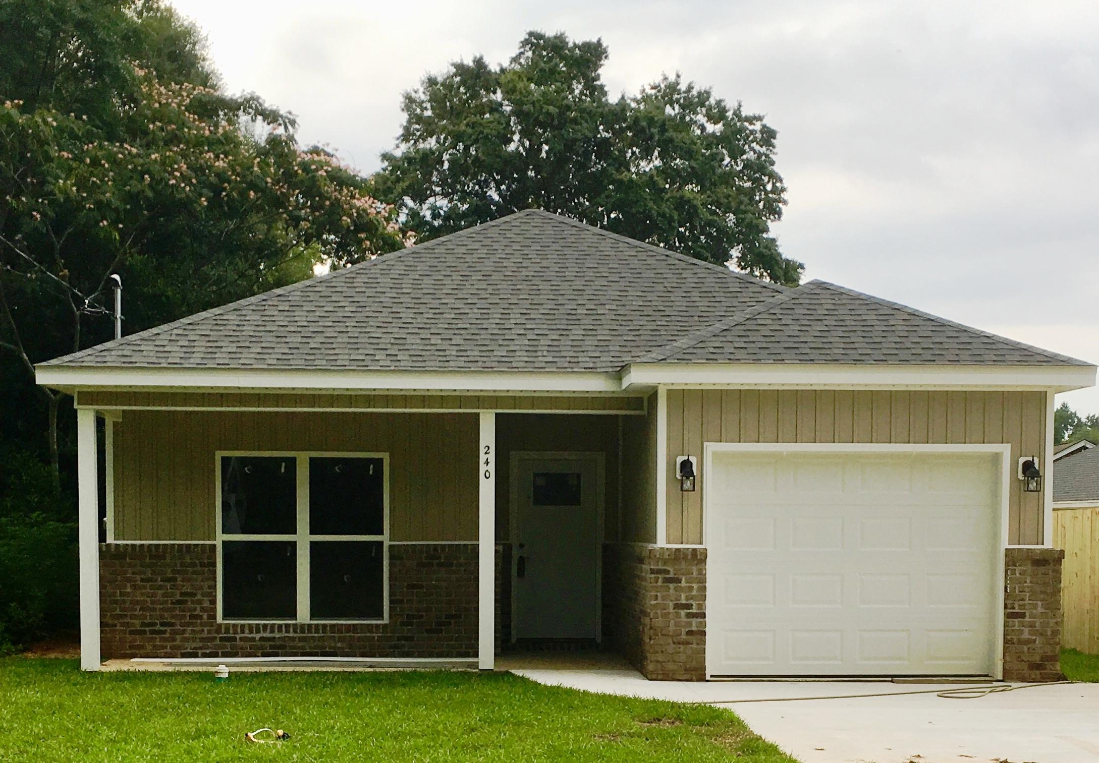 a house view with a garden space
