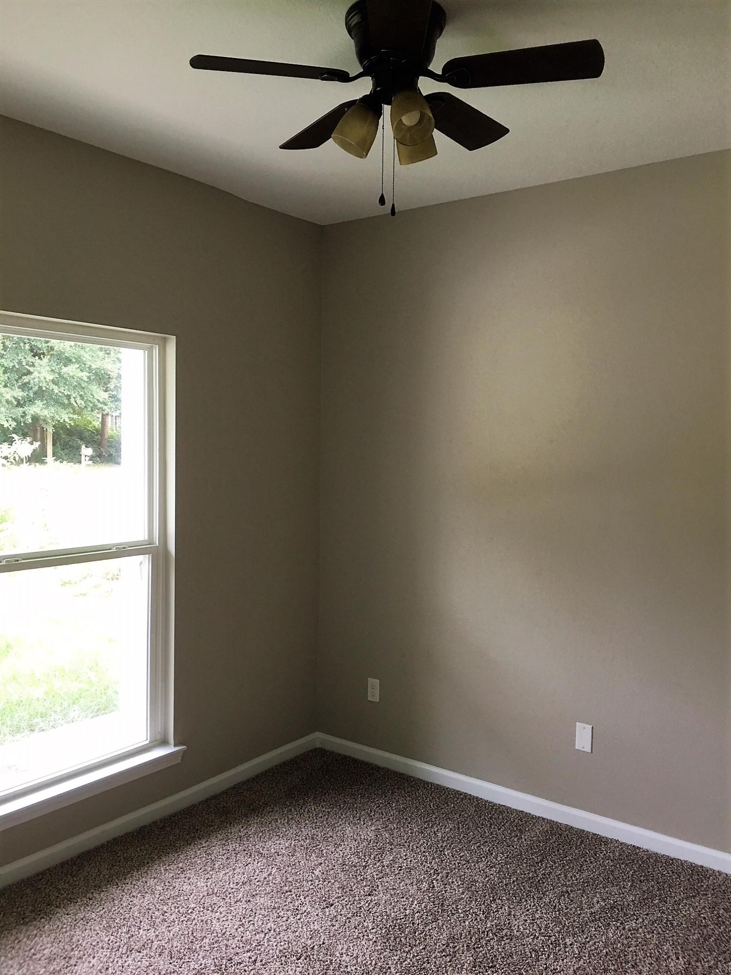 240 Dixie Street Crestview, FL 32536 - Photo 15 of 20 an empty room with a window
