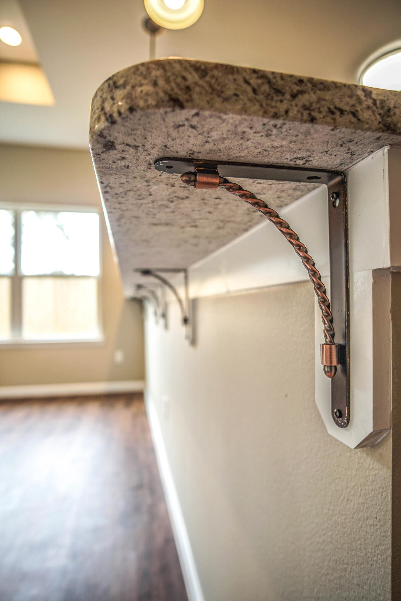 240 Dixie Street Crestview, FL 32536 - Photo 9 of 20 a view of a room with a wooden floor