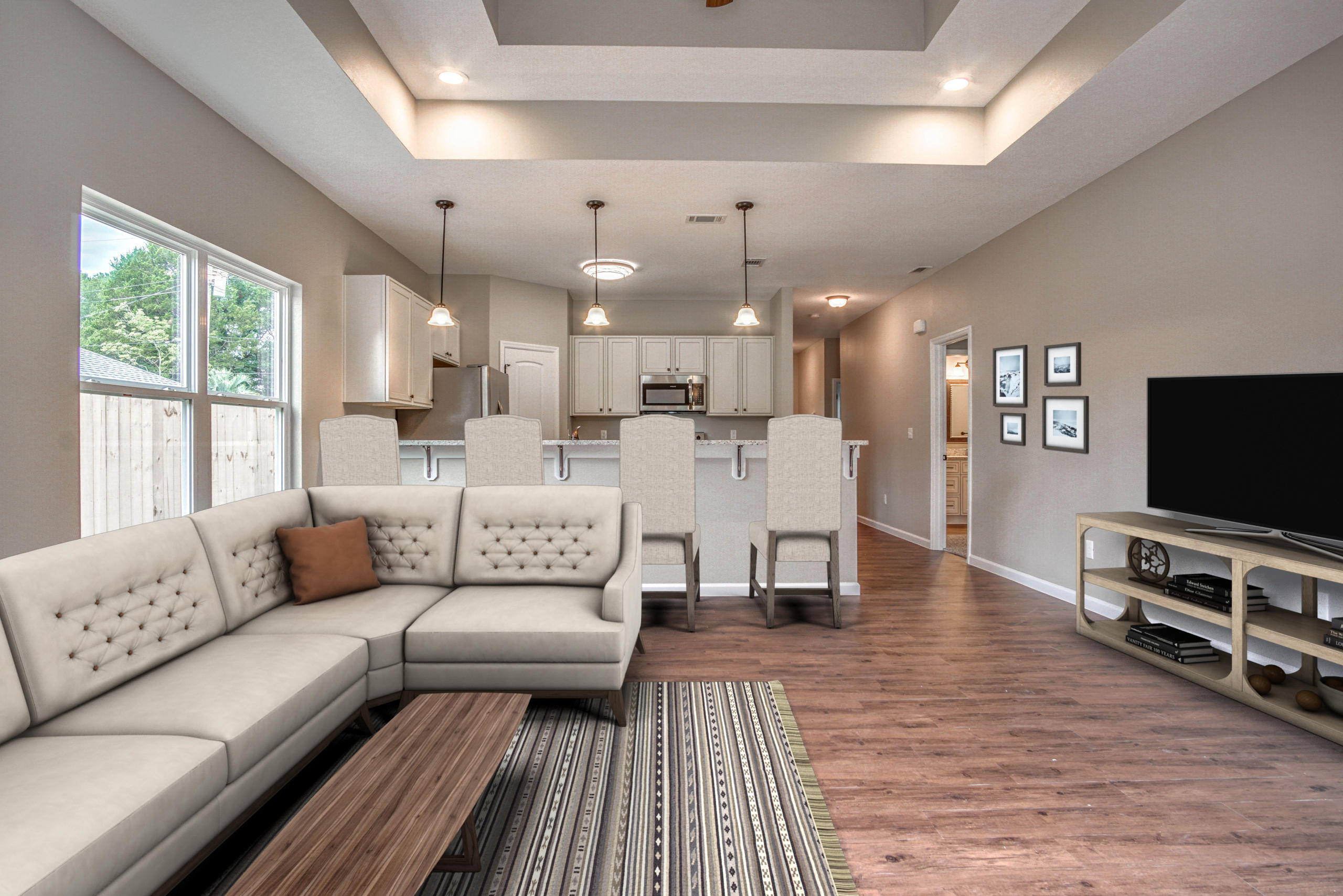 240 Dixie Street Crestview, FL 32536 - Photo 10 of 20 a living room with furniture and a flat screen tv