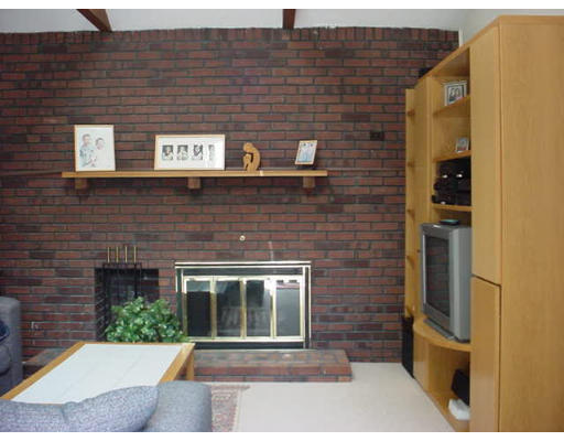 117 Woodcliff Road Brookline, MA 02467 - Photo 5 of 8 a view of a brick wall of the house