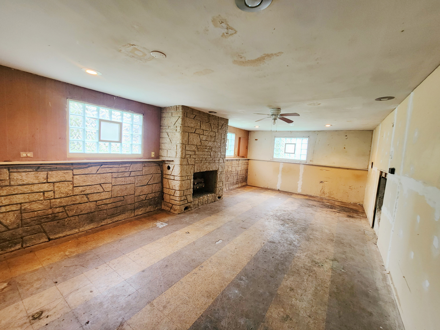 3236 Roesner Drive Markham, IL 60428 - Photo 12 of 12 a view of an empty room with a fireplace and a window