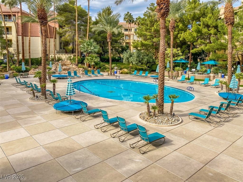 260 East Flamingo Road, Unit 229 Las Vegas, NV 89169 - Photo 7 of 41 Community pool with a patio