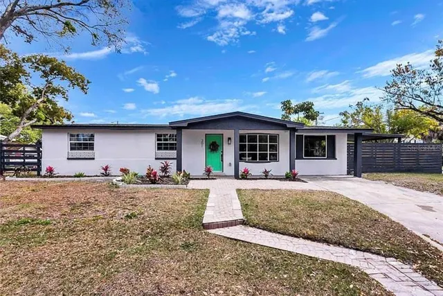 front view of a house with a patio