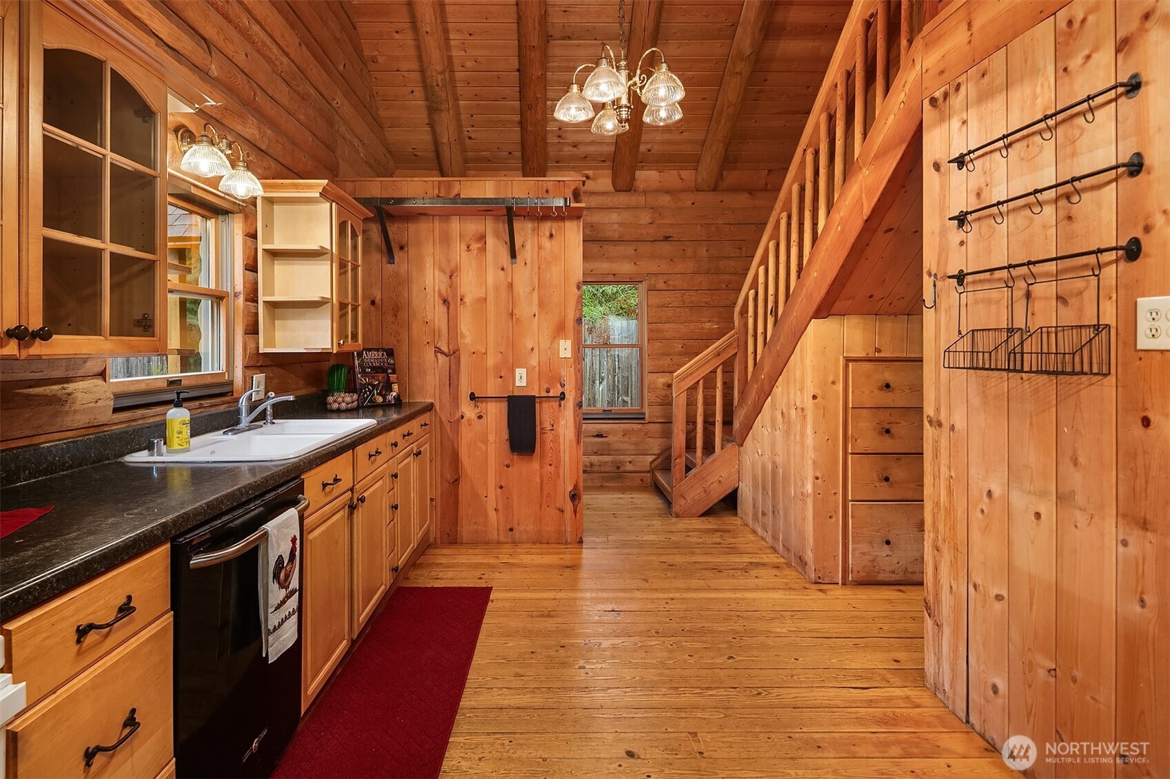 4 East Mountain View Road Camano Island, WA 98282 - Photo 11 of 26 a view of a kitchen with stainless steel appliances granite countertop a sink and cabinets