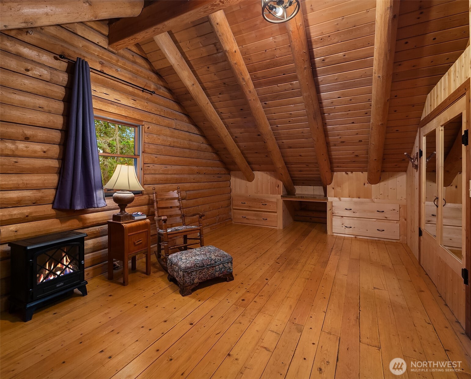 4 East Mountain View Road Camano Island, WA 98282 - Photo 18 of 26 a view of a chairs and fire pit in the balcony