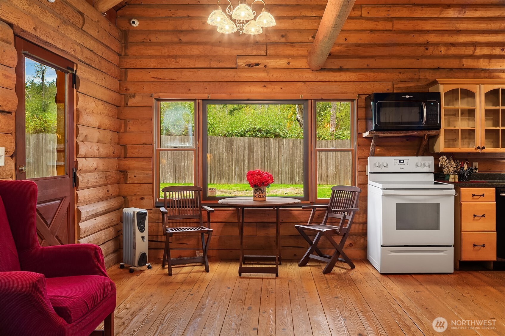 4 East Mountain View Road Camano Island, WA 98282 - Photo 8 of 26 a view of a livingroom with furniture window and outside view