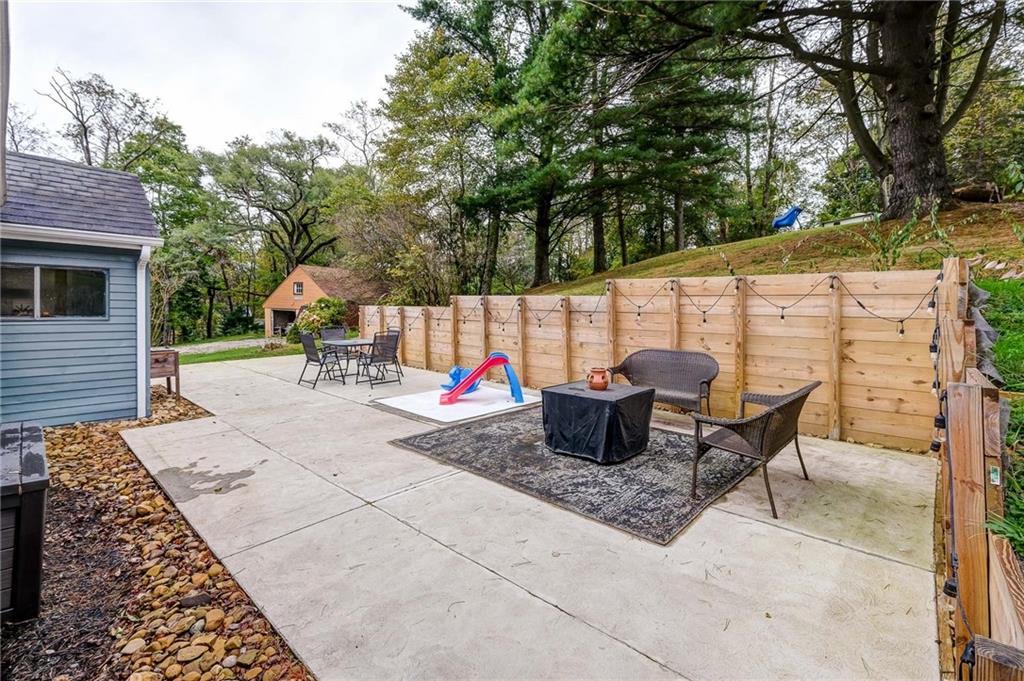 410 Dellenbaugh Road Tarentum, PA 15084 - Photo 21 of 25 a backyard of a house with seating space