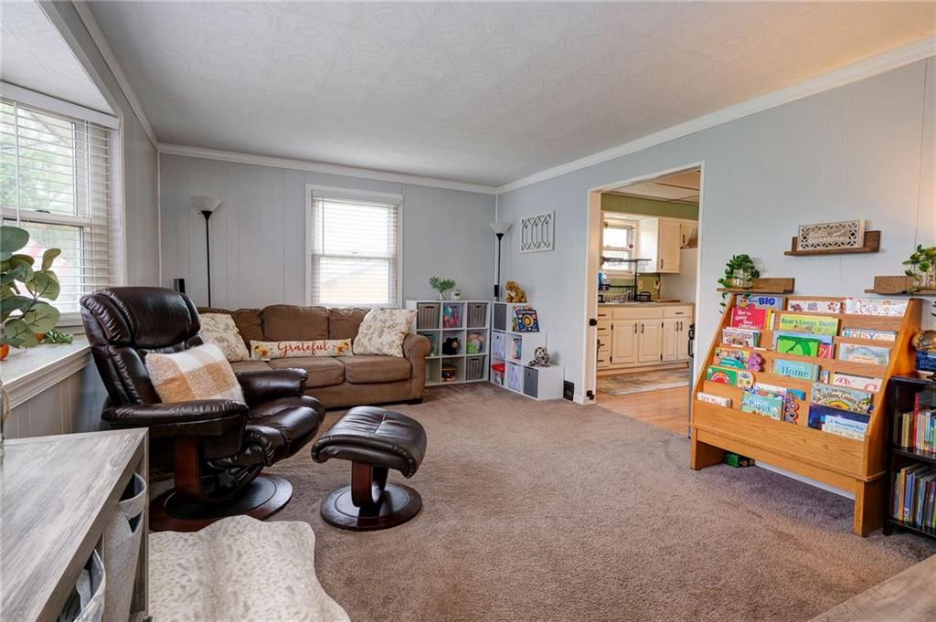 410 Dellenbaugh Road Tarentum, PA 15084 - Photo 3 of 25 a living room with furniture and a window