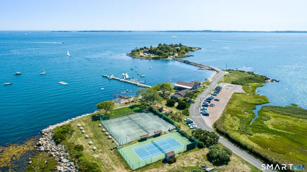 a view of a lake with a big yard