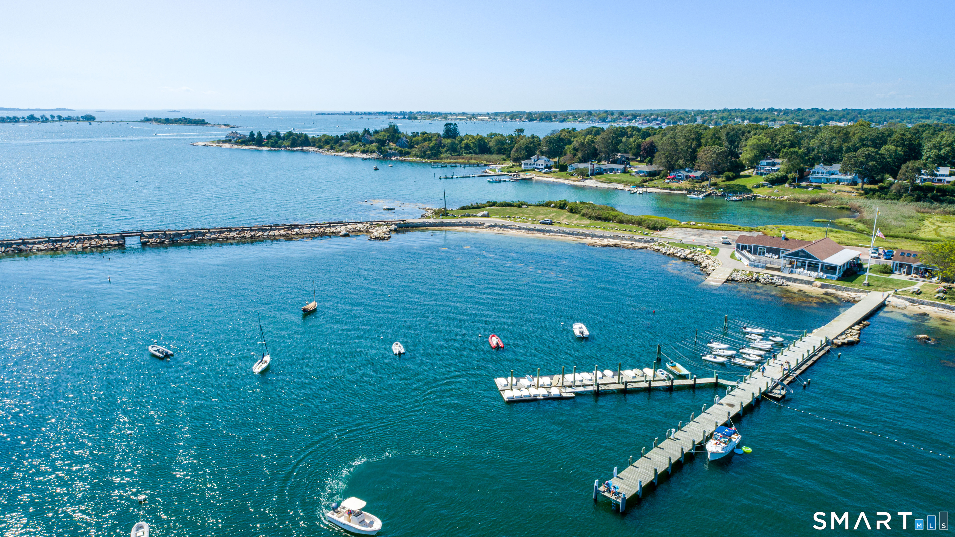 28 Money Point Road Stonington, CT 06355 - Photo 25 of 31 a view of a lake with a big yard