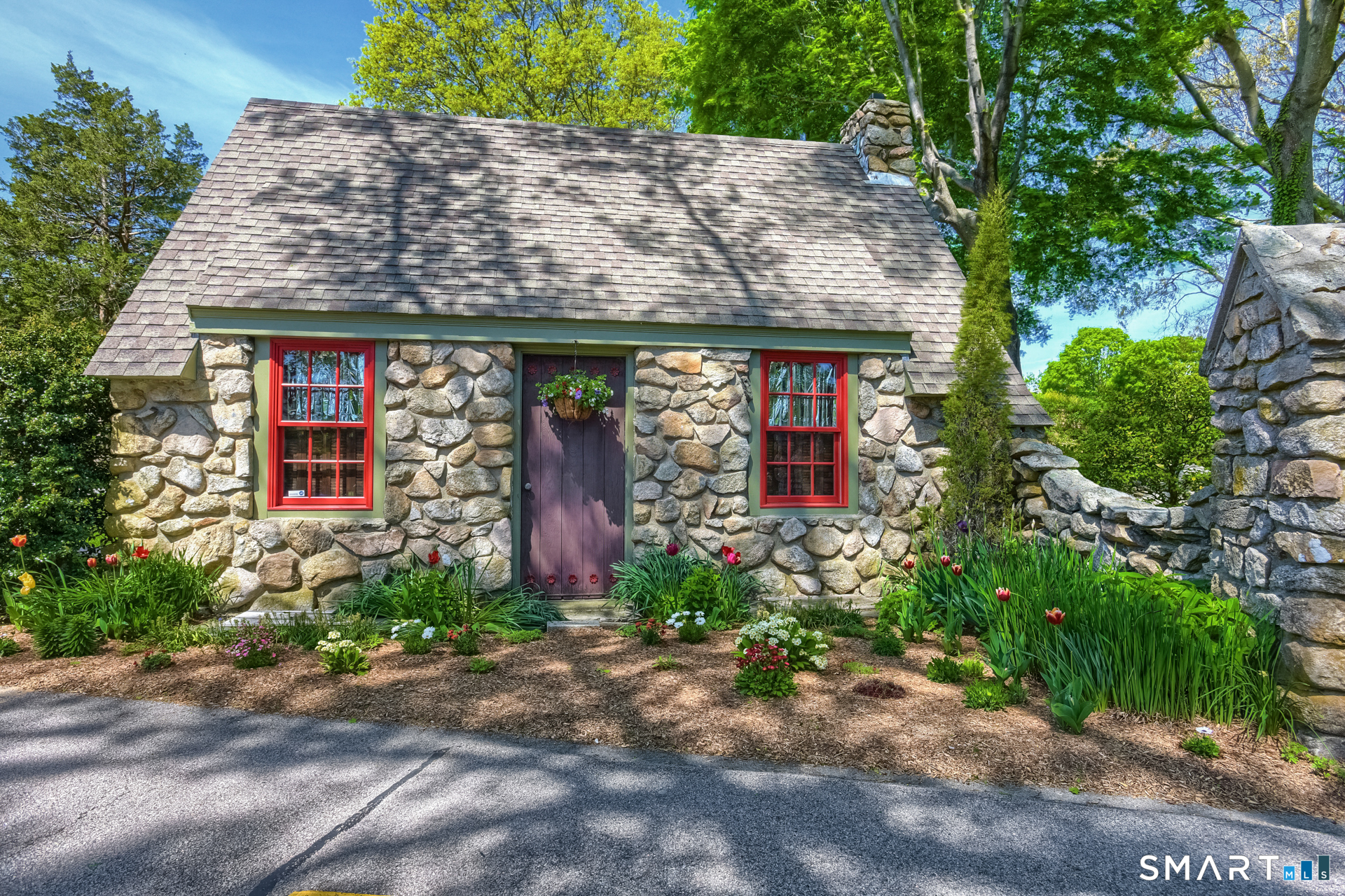 28 Money Point Road Stonington, CT 06355 - Photo 8 of 31 front view of a house with potted plants