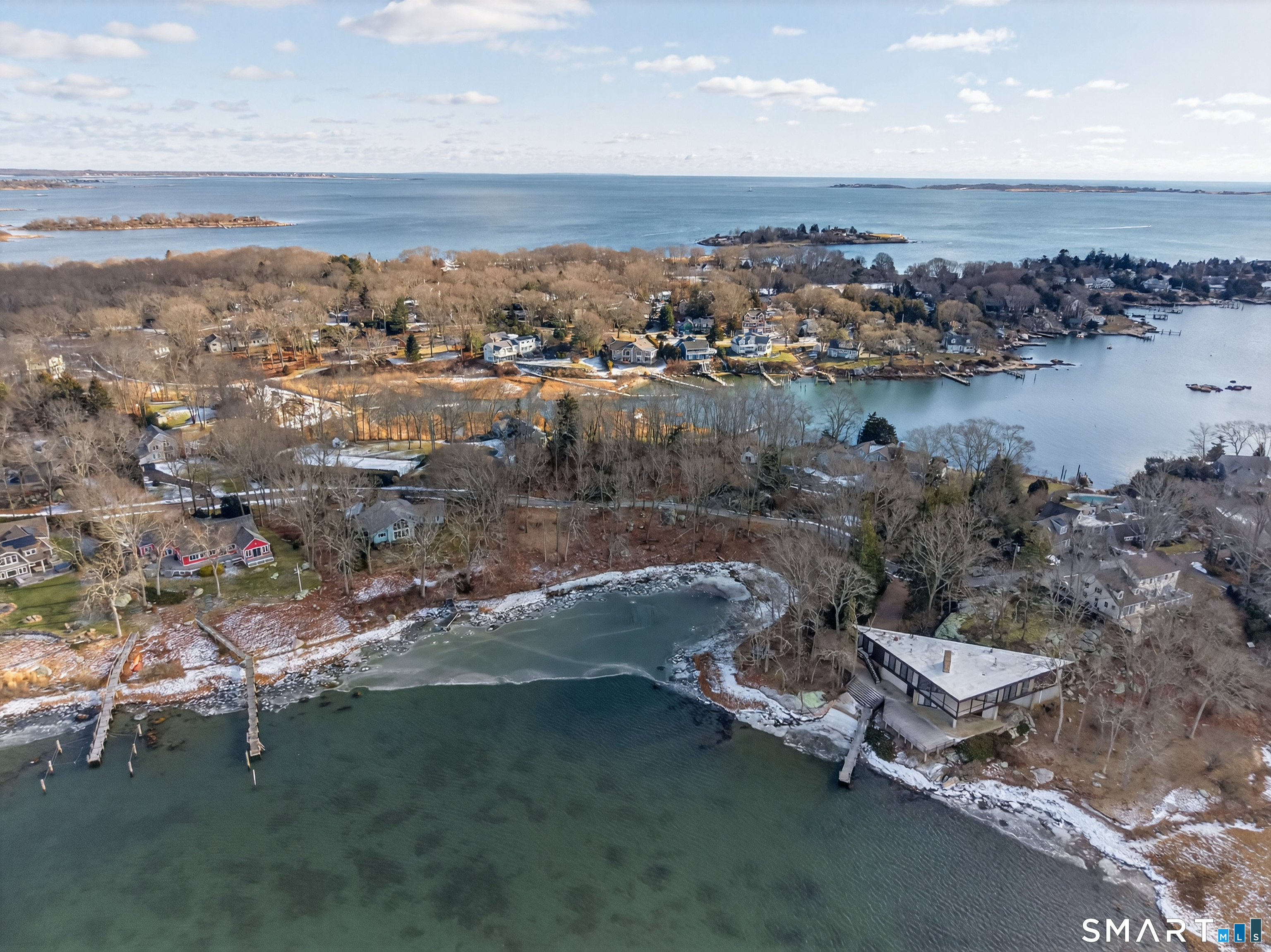 28 Money Point Road Stonington, CT 06355 - Photo 9 of 31 an aerial view of a houses with ocean view