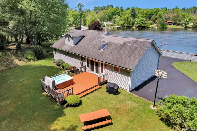 an aerial view of a house having yard