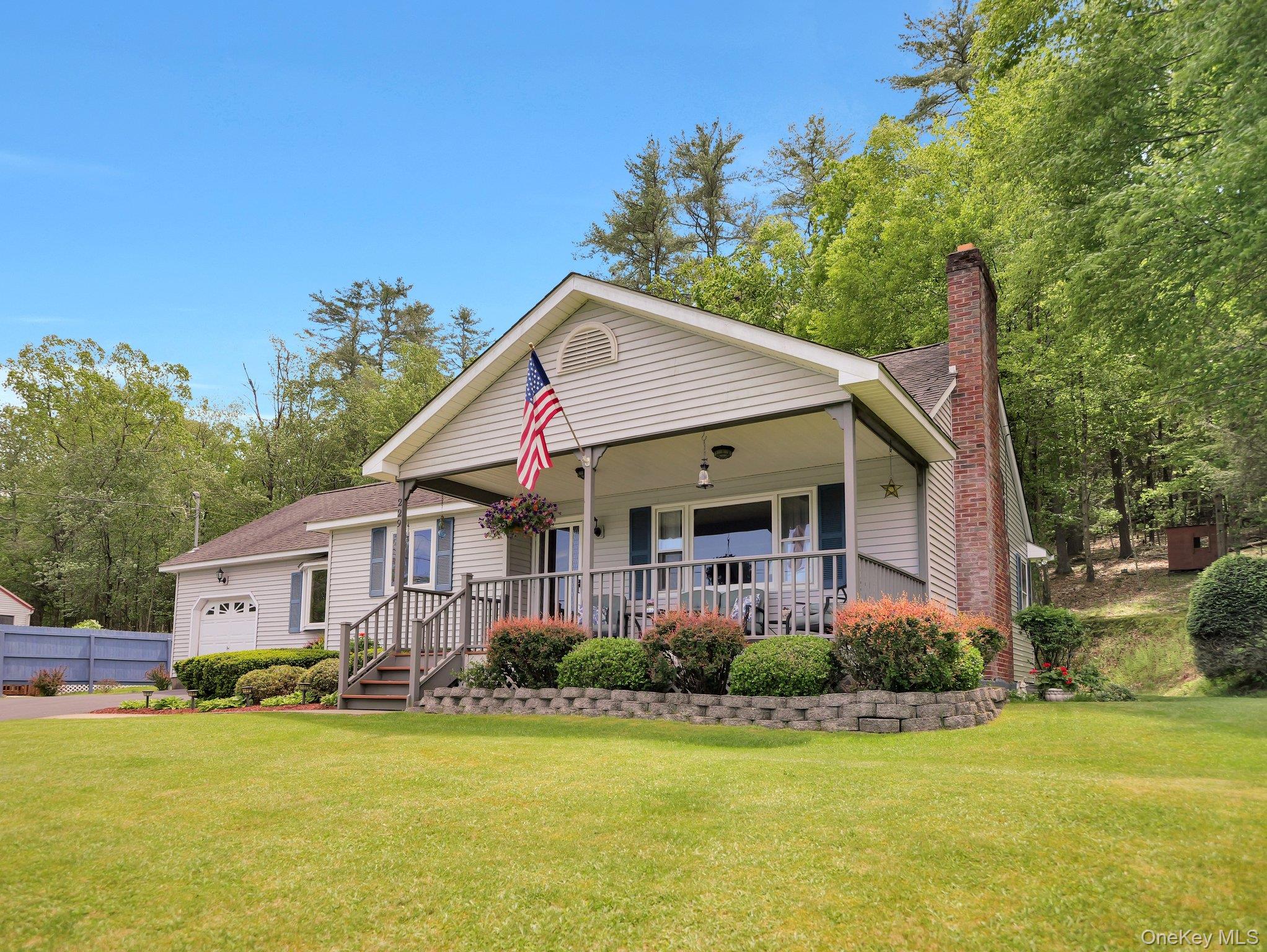 229 Eldred-Yulan Road Barryville, NY 12719 - Photo 25 of 34 a front view of a house with swimming pool having outdoor seating
