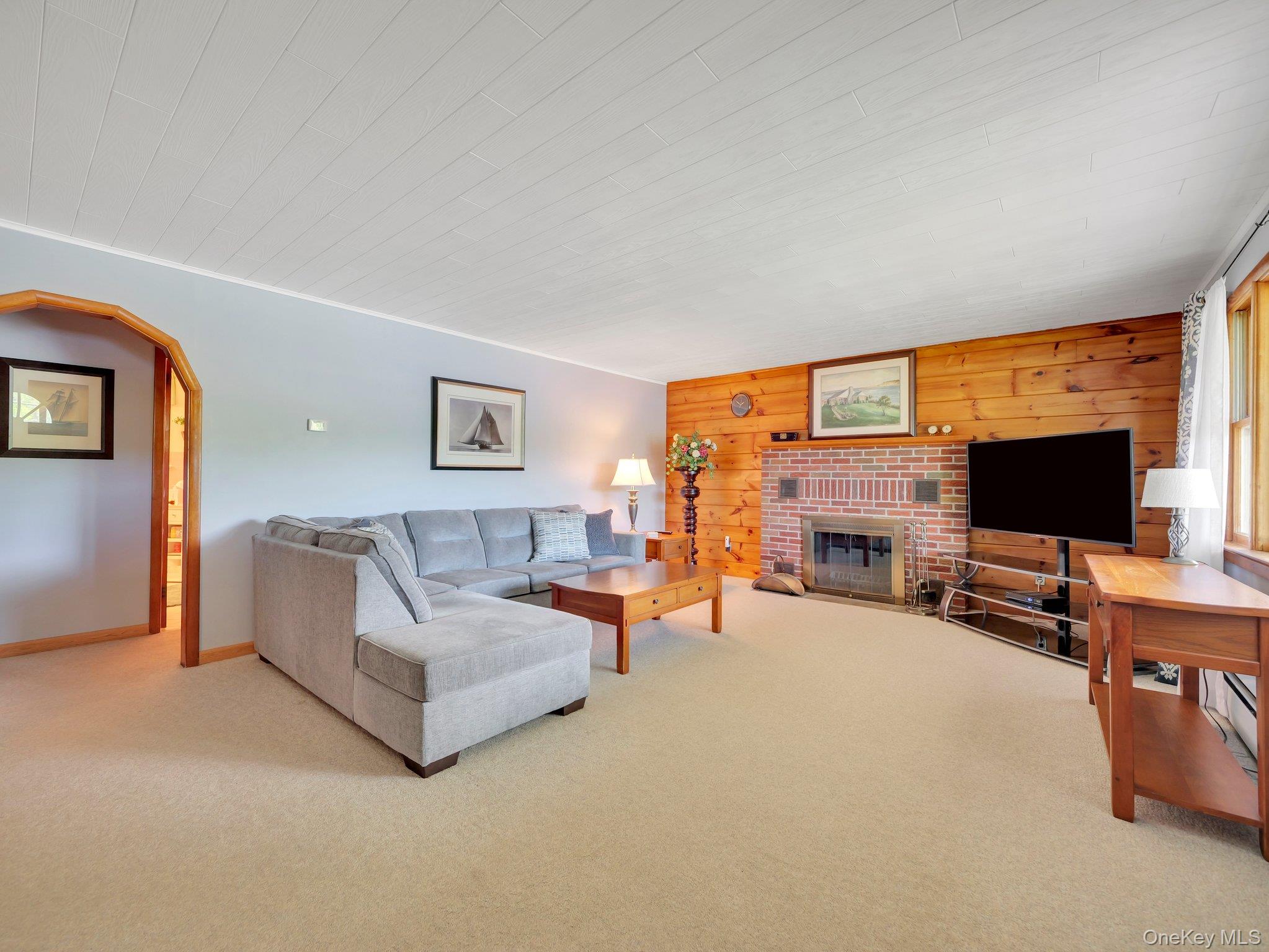 229 Eldred-Yulan Road Barryville, NY 12719 - Photo 5 of 34 a living room with furniture and a flat screen tv