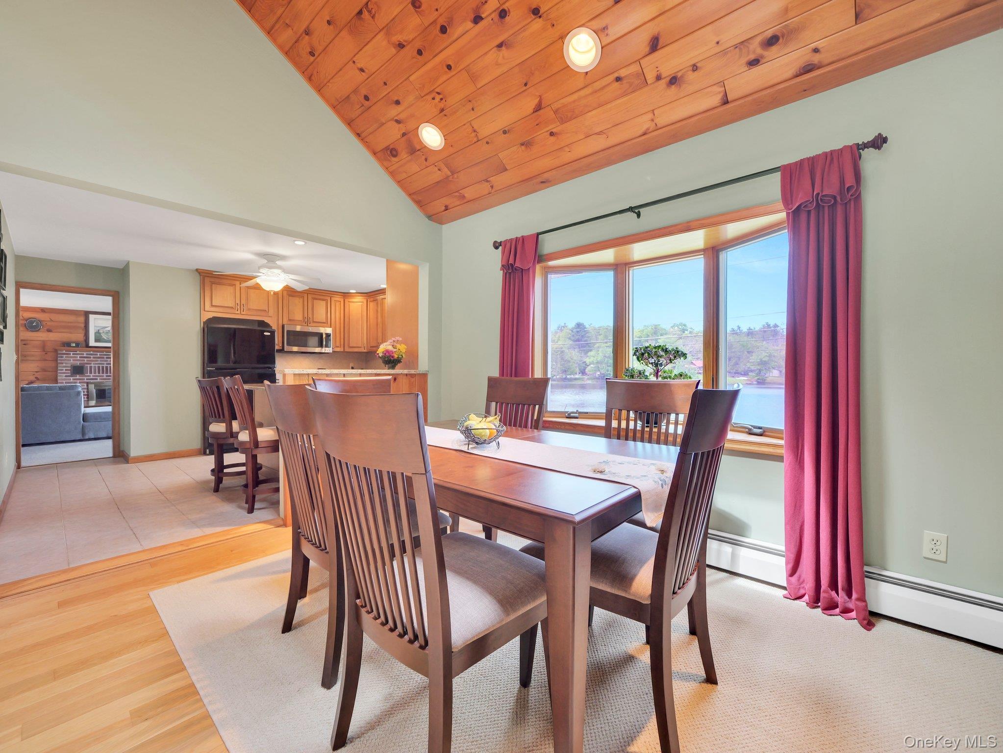 229 Eldred-Yulan Road Barryville, NY 12719 - Photo 7 of 34 a view of a dining room with furniture window and wooden floor
