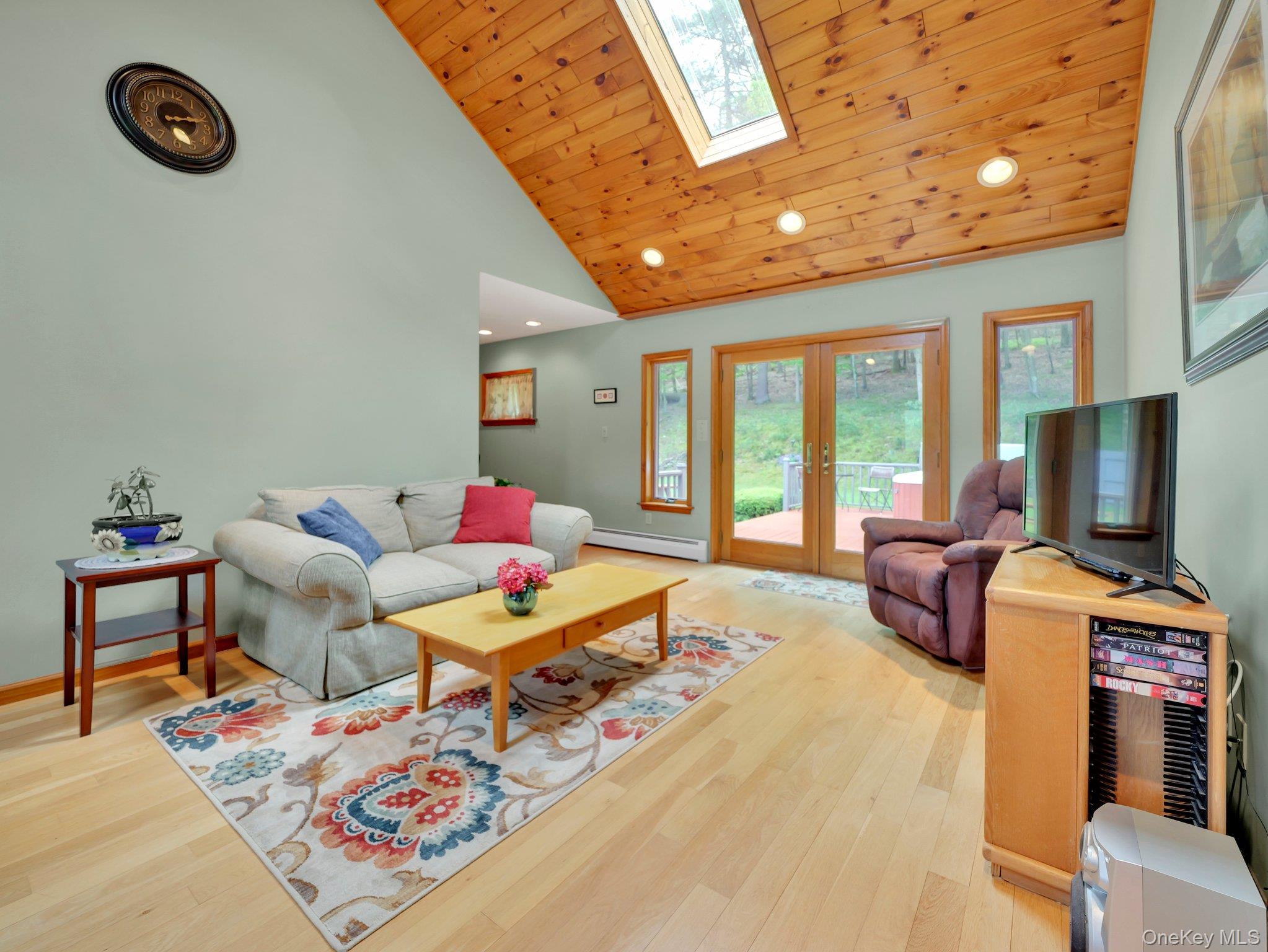 229 Eldred-Yulan Road Barryville, NY 12719 - Photo 8 of 34 a living room with furniture and a flat screen tv