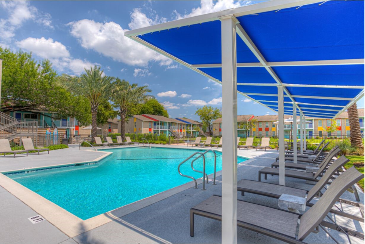 8787 Hammerly Boulevard, Unit 227 Houston, TX 77080 - Photo 30 of 40 a view of a swimming pool with a patio