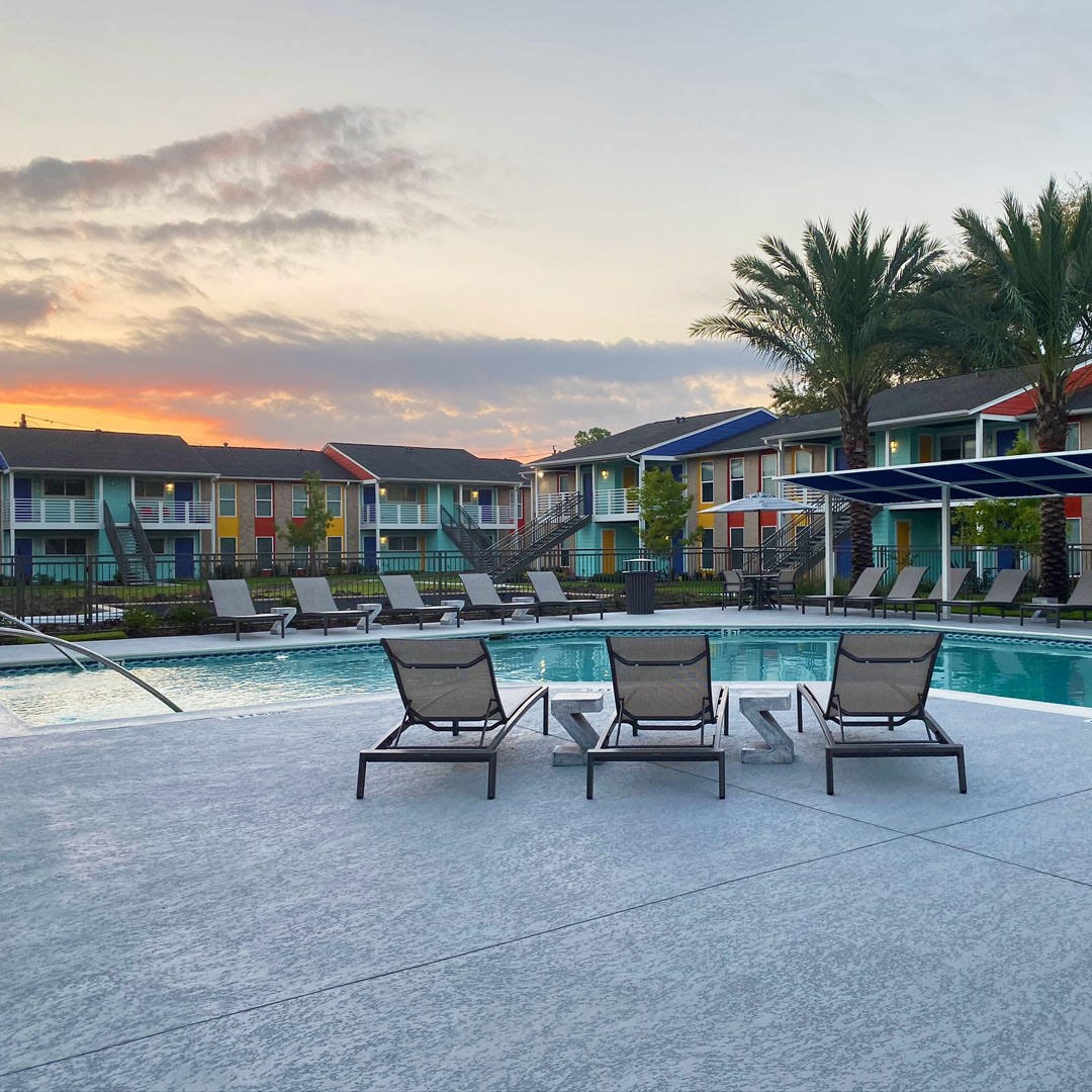 8787 Hammerly Boulevard, Unit 227 Houston, TX 77080 - Photo 32 of 40 a view of a patio with a table and chairs