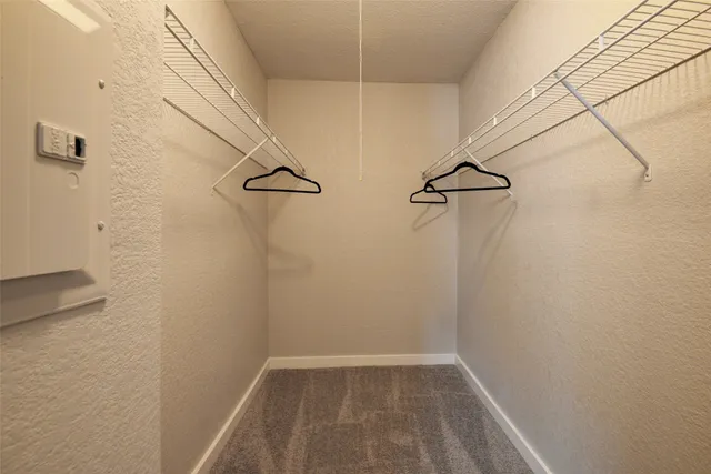 a view of small space with racks on the wall