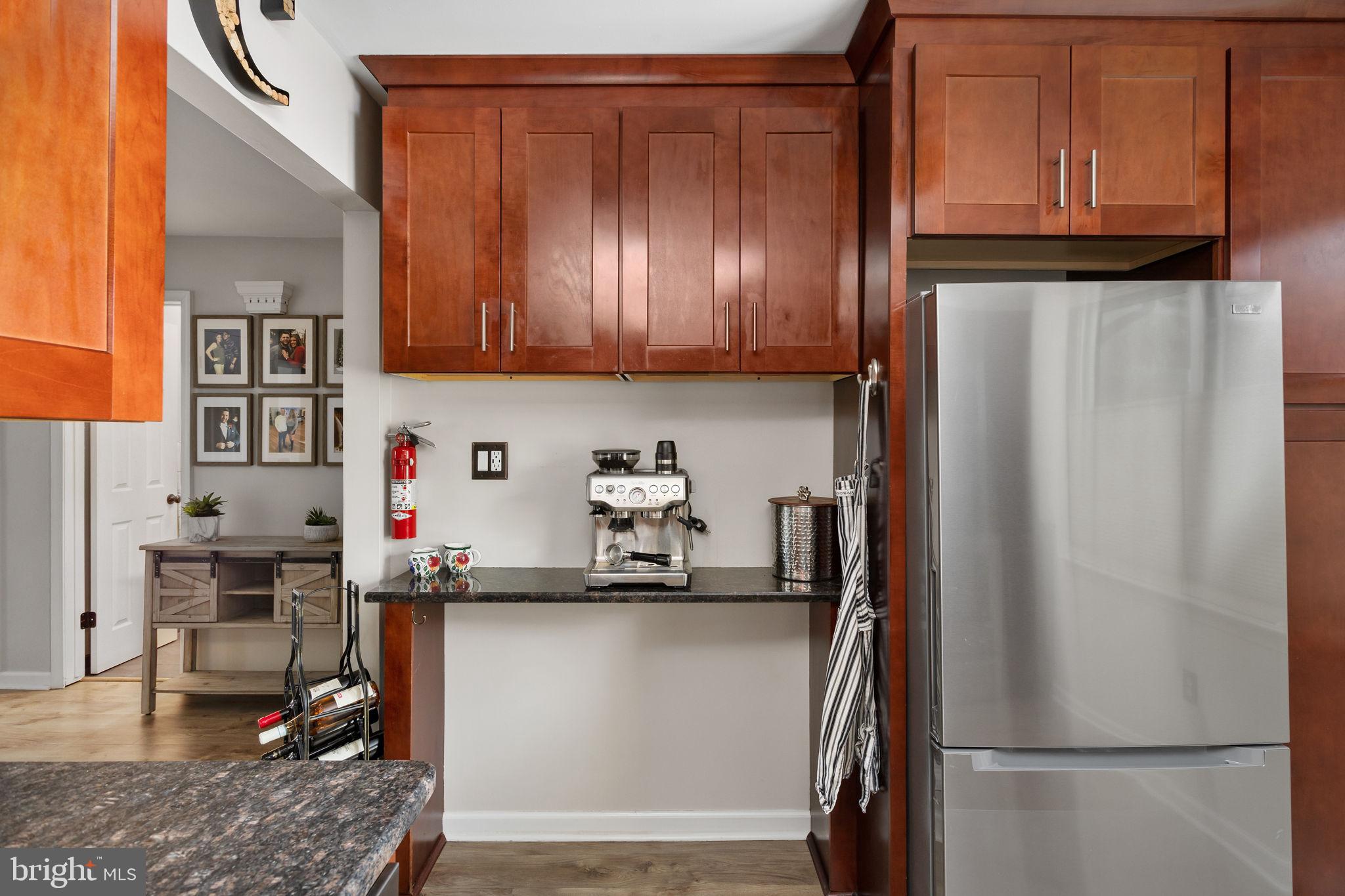 1306 Silver Court Hamilton, NJ 08690 - Photo 15 of 28 a kitchen with stainless steel appliances granite countertop a refrigerator and a stove top oven