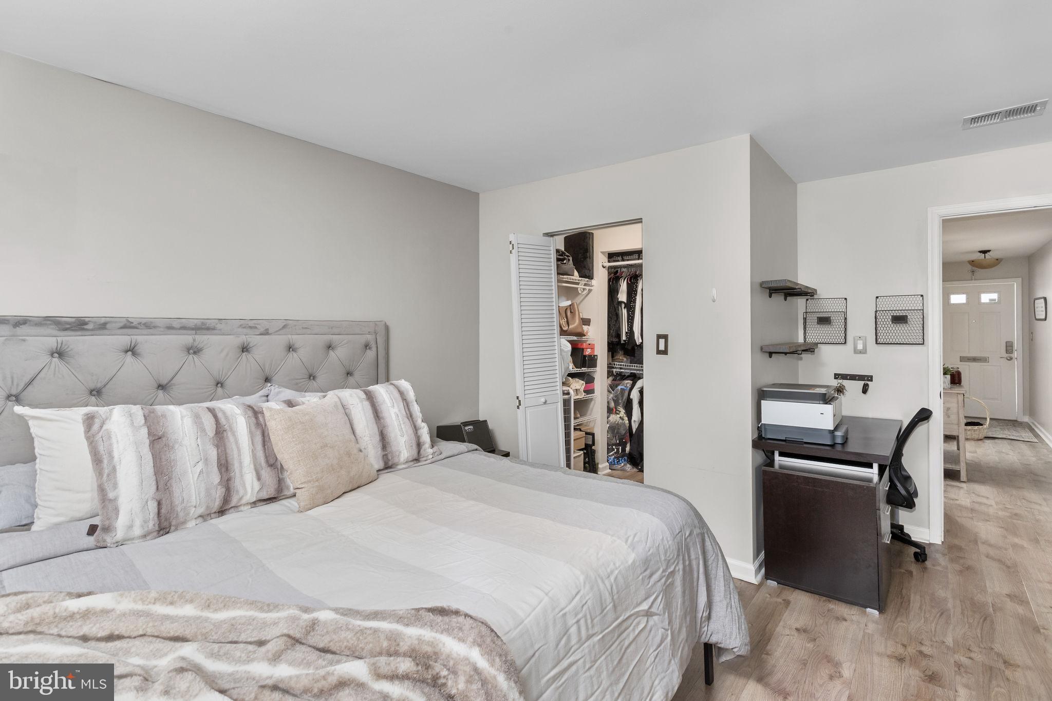 1306 Silver Court Hamilton, NJ 08690 - Photo 19 of 28 a bedroom with a bed and dresser