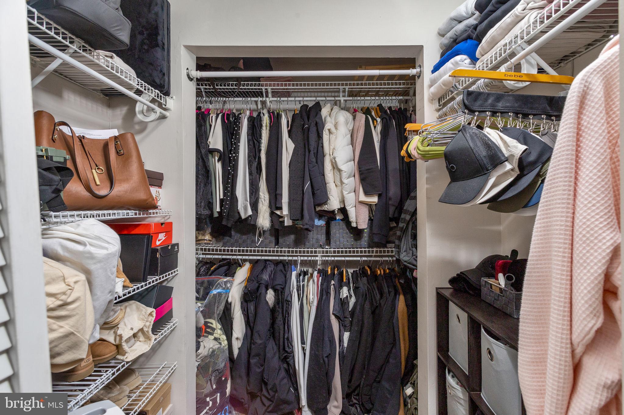 1306 Silver Court Hamilton, NJ 08690 - Photo 20 of 28 a view of walk in closet with clothes and shoes