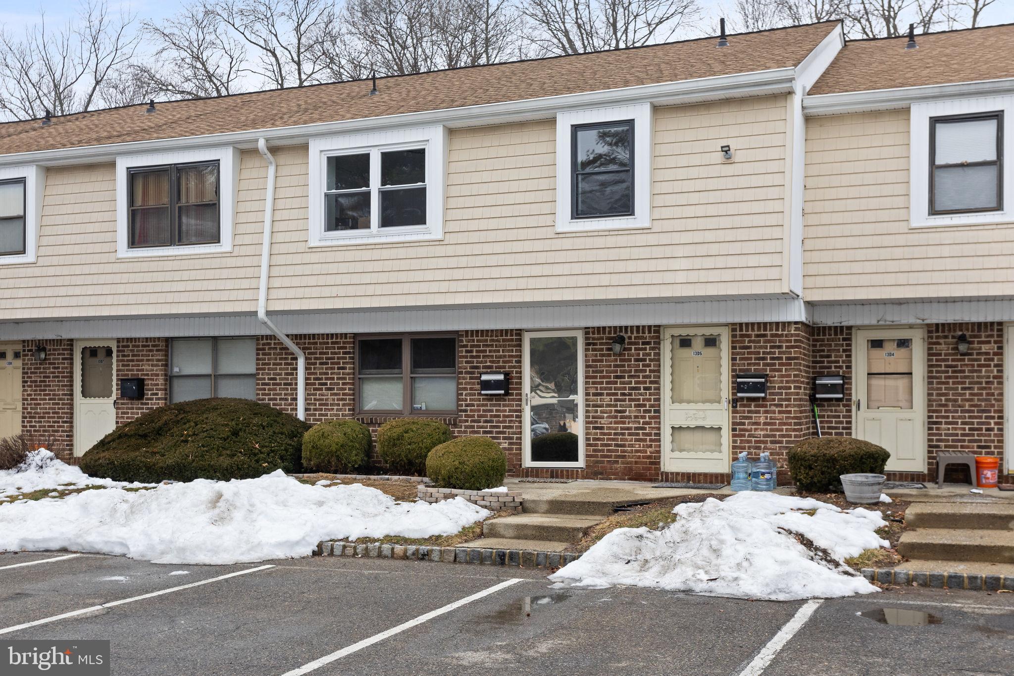1306 Silver Court Hamilton, NJ 08690 - Photo 2 of 28 a view of a house and a yard