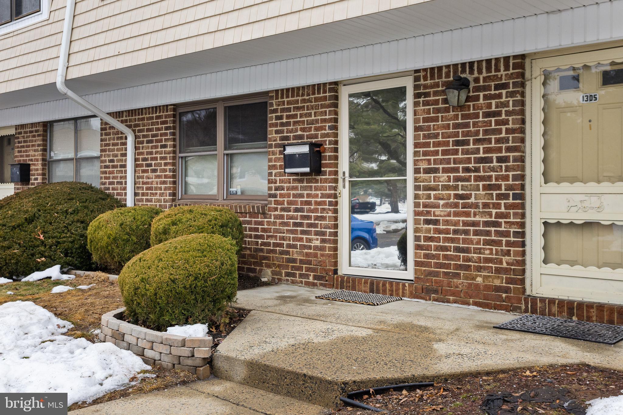 1306 Silver Court Hamilton, NJ 08690 - Photo 4 of 28 a view of a door of a house with outdoor space