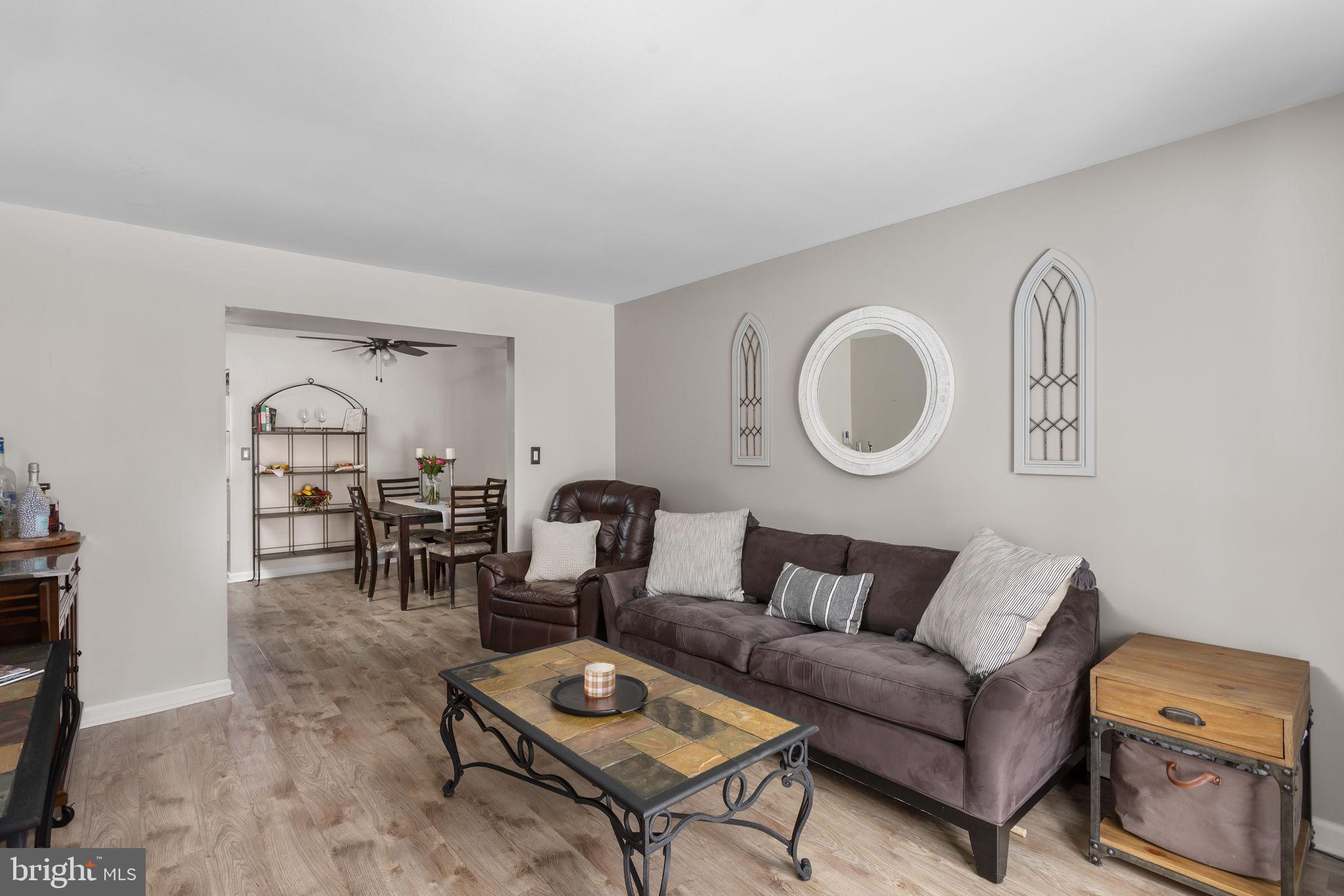 1306 Silver Court Hamilton, NJ 08690 - Photo 10 of 28 a living room with furniture and a mirror