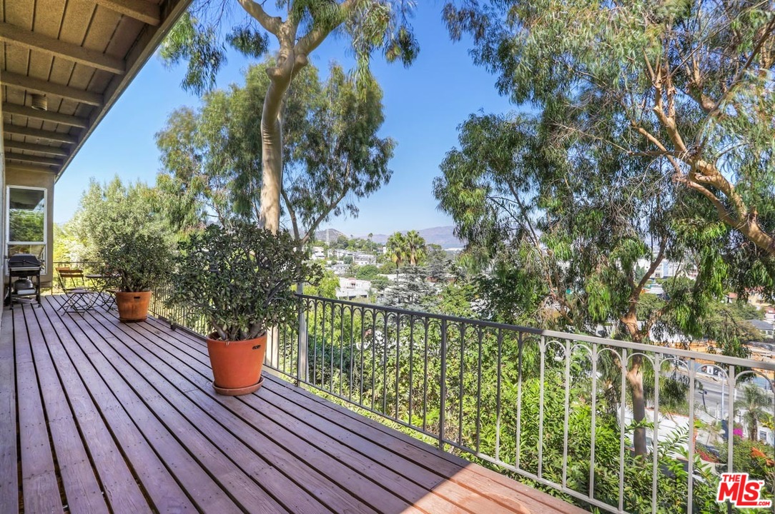 2730 Ivan Court Los Angeles, CA 90039 - Photo 11 of 38 a view of balcony with wooden floor and fence