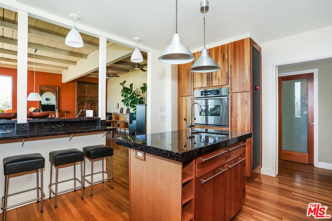 2730 Ivan Court Los Angeles, CA 90039 - Photo 14 of 38 a kitchen with stainless steel appliances granite countertop a stove and a refrigerator