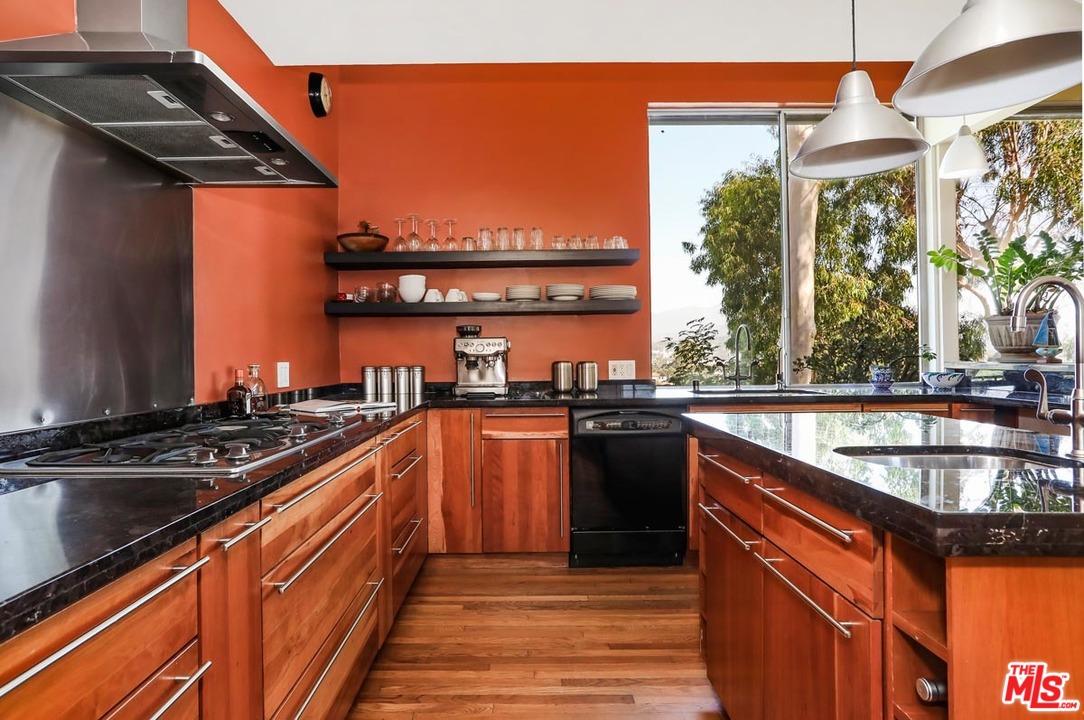 2730 Ivan Court Los Angeles, CA 90039 - Photo 15 of 38 a kitchen with stainless steel appliances granite countertop a stove and a sink