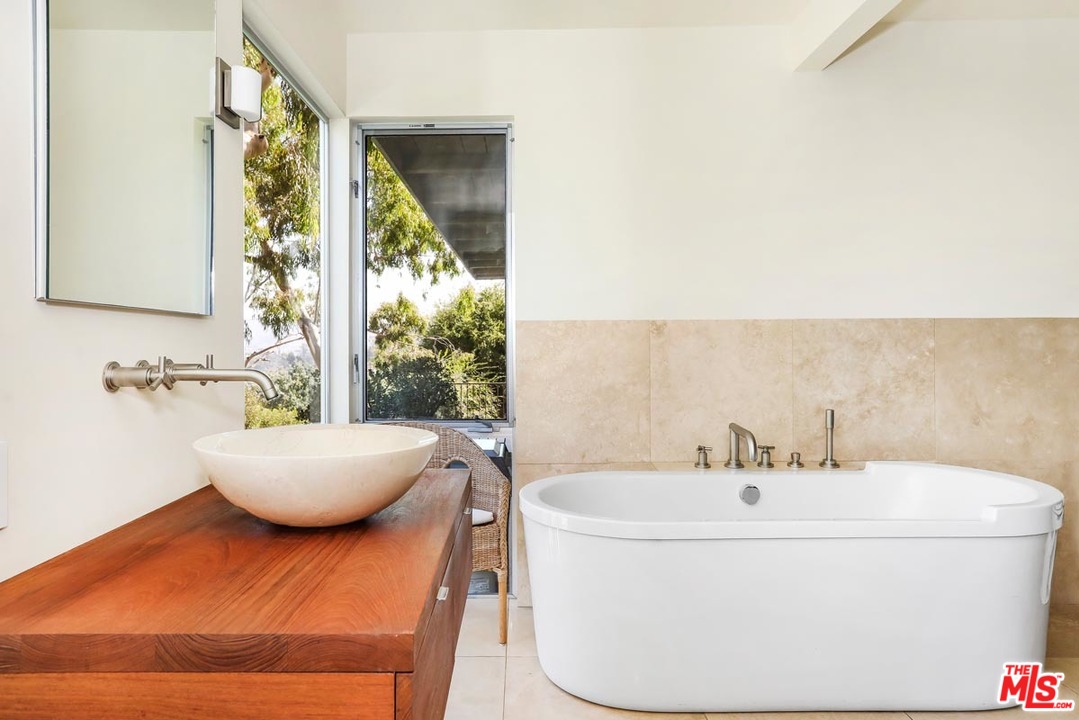 2730 Ivan Court Los Angeles, CA 90039 - Photo 19 of 38 a bathroom with a bathtub and sink
