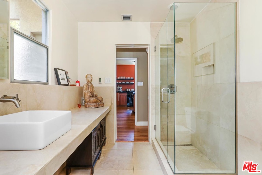 2730 Ivan Court Los Angeles, CA 90039 - Photo 24 of 38 a bathroom with a tub sink and mirror