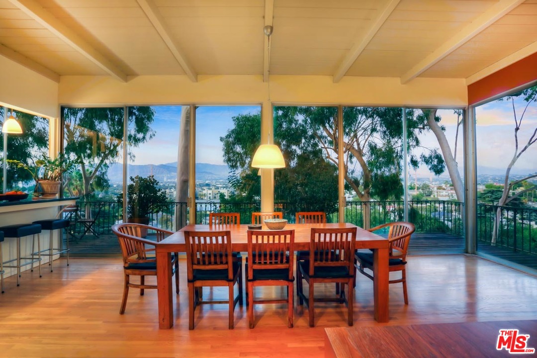 2730 Ivan Court Los Angeles, CA 90039 - Photo 32 of 38 a dining room with furniture and wooden floor