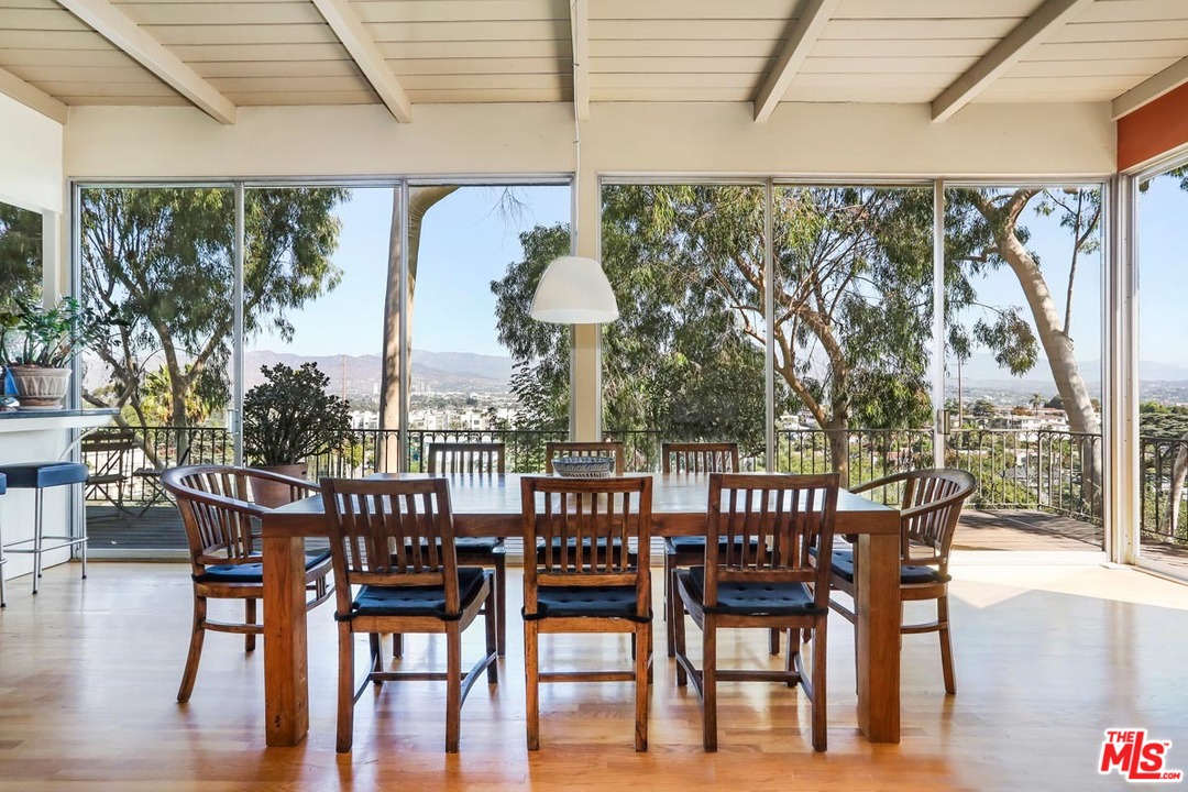 2730 Ivan Court Los Angeles, CA 90039 - Photo 9 of 38 a view of a dining room with furniture window and wooden floor