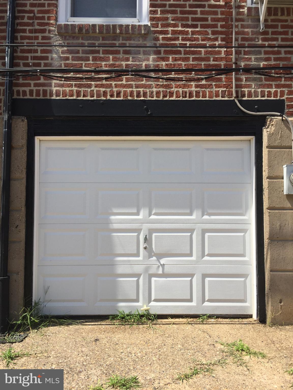 7640 Sherwood Road Philadelphia, PA 19151 - Photo 8 of 10 Garage Door