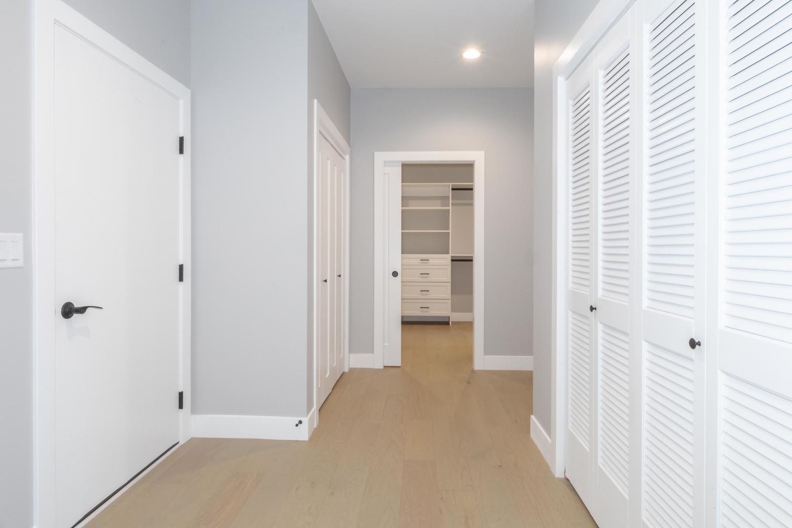 520 South 6th Street Fairbury, IL 61739 - Photo 11 of 42 a view of a hallway with wooden floor and closet area