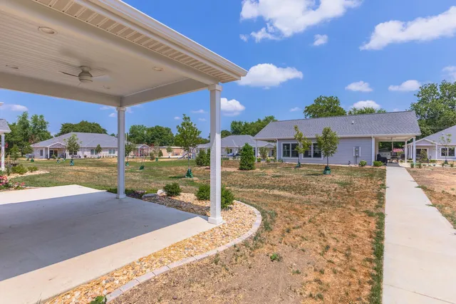 an aerial view of residential house with outdoor space
