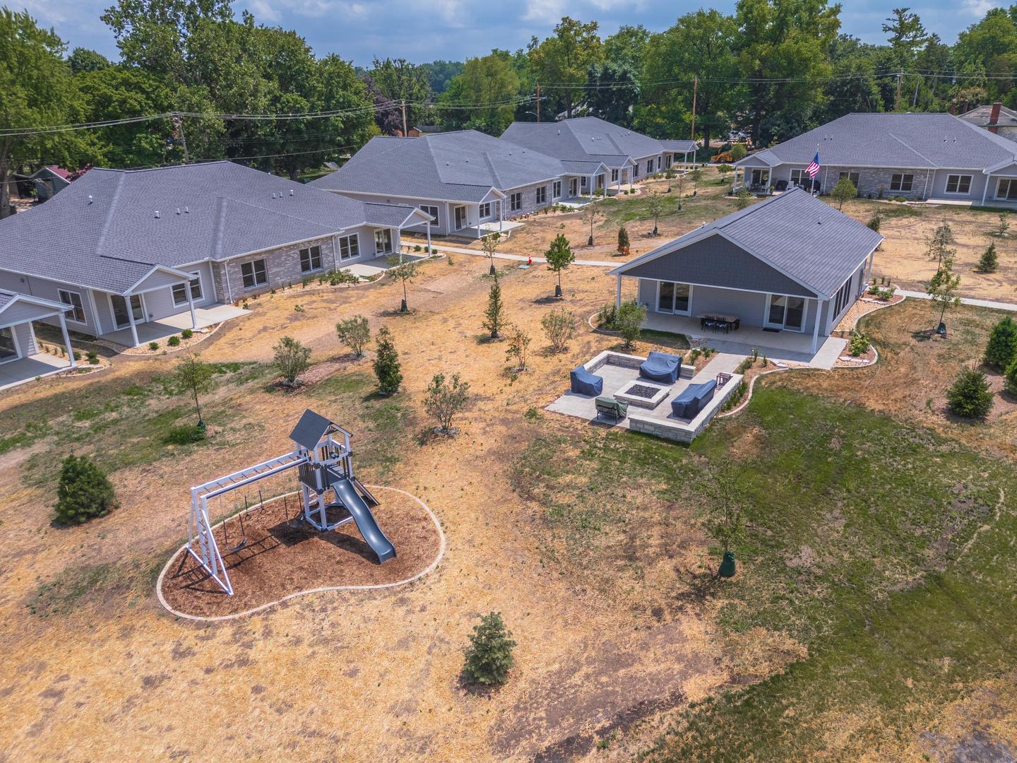520 South 6th Street Fairbury, IL 61739 - Photo 38 of 42 an aerial view of residential houses and car parked