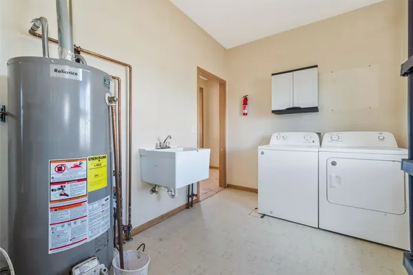 a utility room with dryer and washer