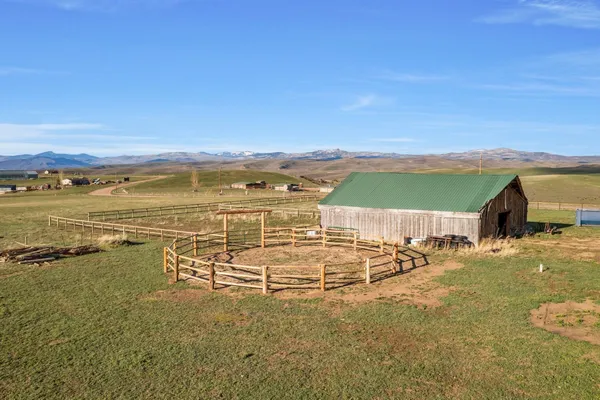 a view of a yard with an ocean view