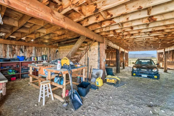 a view of a porch with wooden floor