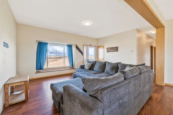 a living room with furniture and a window